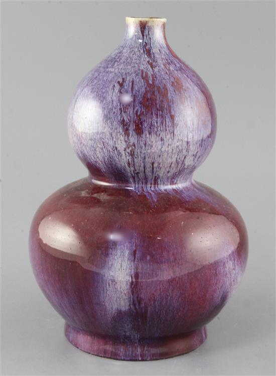 A Chinese flambe glazed double gourd vase, late 19th / early 20th century, 27cm, tiny rim chips